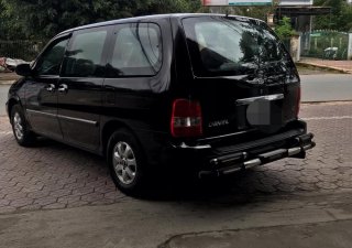 Kia Carnival GS 2006 - Cần bán xe Kia Carnival năm 2006 màu đen, giá chỉ 220 triệu, nhập khẩu