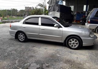 Kia Spectra 2004 - Cần bán lại xe Kia Spectra đời 2004, màu bạc
