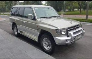 Mitsubishi Pajero V6 - 3.5 2003 - Gia đình bán Mitsubishi Pajero sản xuất năm 2003, màu vàng cát