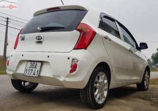 Kia Picanto 1.25 AT 2012 - Cần bán xe Kia Picanto 1.25 số tự động, đời 2012, máy xăng, màu trắng, nội thất màu ghi, dáng Hatchback