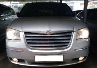 Chrysler Grand Voyager 3.8 Limited 2010 - Bán Chrysler Grand Voyager Limited 3.8 máy xăng, màu bạc, sản xuất 2010 đăng ký 2012