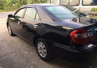 Toyota Camry   2004 - Bán ô tô Toyota Camry sản xuất năm 2004, màu đen, nhập khẩu 