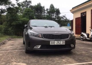 Kia Cerato 2016 - Cần bán gấp Kia Cerato năm 2016, màu đen chính chủ, giá chỉ 480 triệu