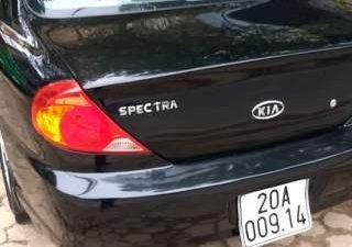 Kia Spectra 2004 - Cần bán lại xe Kia Spectra đời 2004, màu đen, nhập khẩu xe gia đình