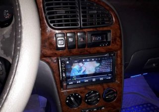 Kia Spectra MT 2004 - Cần bán gấp Kia Spectra MT đời 2004, màu bạc, nhanh tay liên hệ