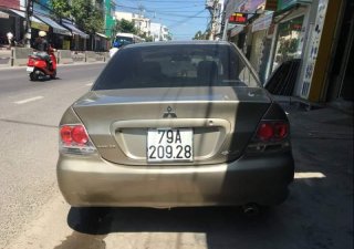 Mitsubishi Lancer   2005 - Bán xe Mitsubishi Lancer 2005, màu vàng còn mới, giá tốt