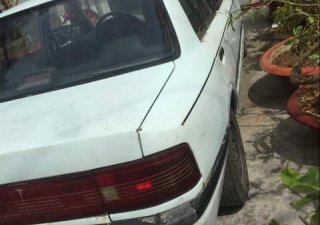 Mazda 323 1992 - Cần bán lại xe Mazda 323 năm 1992, màu trắng, nhập khẩu, 23tr