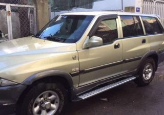 Ssangyong Musso 2004 - Lên đời bán xe Ssangyong Musso 2004, màu vàng, nhập khẩu