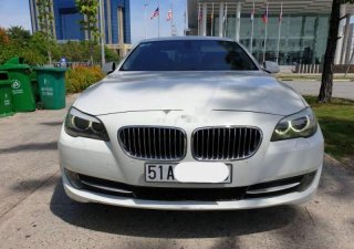 BMW 5 Series  528i  2010 - Cần bán BMW 5 Series 528i sản xuất năm 2010, màu trắng, xe còn mới tinh