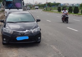 Toyota Corolla altis 1.8G AT 2017 - Cần bán lại xe Toyota Corolla altis 1.8G AT 2017, màu đen như mới 