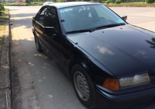 BMW 3 Series 320i 1997 - Cần bán lại xe BMW 3 Series 320i đời 1997, màu đen, nhập khẩu  