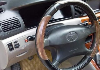 Toyota Corolla altis  MT 2003 - Bán Toyota Corolla Altis MT đời 2003, màu trắng, còn rất mới