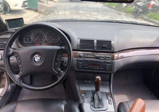 BMW 3 Series  325i  2005 - Cần bán BMW 3 Series 325i 2005, màu vàng, xe nhập