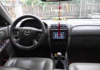 Mazda 626 2.0 MT 2003 - Bán Mazda 626 2.0 MT đời 2003, màu đen ít sử dụng