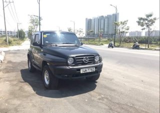 Ssangyong Korando 2004 - Bán ô tô Ssangyong Korando đời 2004, màu đen, nhập khẩu số sàn, giá chỉ 168 triệu