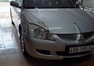 Mitsubishi Lancer 2004 - Cần bán lại xe Mitsubishi Lancer 2004, màu bạc số tự động, giá tốt