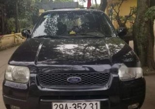 Ford Escape MT 2004 - Cần bán Ford Escape MT 2004, màu đen, xe đi giữ, chăm sóc tốt, gầm cao máy khỏe