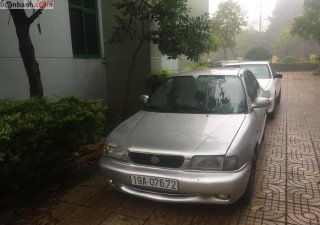 Suzuki Baleno Fi 1996 - Cần bán gấp Suzuki Baleno Fi 1996, màu bạc, máy êm