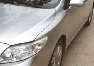 Toyota Corolla altis AT 2009 - Cần bán gấp Toyota Corolla altis AT sản xuất 2009, màu bạc, xe nhập, giá chỉ 450 triệu