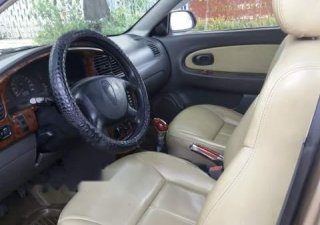 Kia Spectra 2004 - Cần bán Kia Spectra sản xuất năm 2004, màu vàng còn mới