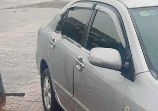 Toyota Corolla altis   2004 - Cần bán lại xe Toyota Corolla altis đời 2004, màu bạc