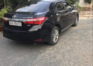 Toyota Corolla altis  MT 2017 - Cần bán gấp Toyota Corolla Altis MT đời 2017, màu đen, xe gia đình sử dụng kĩ nên còn rất đẹp