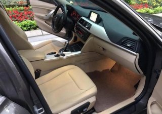 BMW 3 Series 320i 2013 - Gia đình bán BMW 3 Series 320i sản xuất năm 2013, màu nâu, xe nhập
