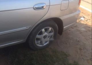Kia Spectra   2005 - Cần bán Kia Spectra sản xuất năm 2005, màu bạc, xe đẹp