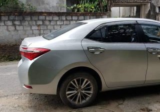 Toyota Corolla altis 1.8G 2015 - Cần bán Toyota Corolla Altis 1.8G đời 2015, màu bạc  