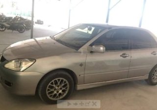 Mitsubishi Lancer    GLX 1.6 AT  2004 - Cần bán Mitsubishi Lancer GLX 1.6 AT sản xuất 2004, xe gia đình đang sử dụng chạy êm tốt