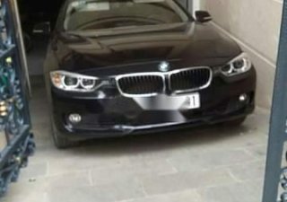 BMW 3 Series 320i  2014 - Cần bán lại xe BMW 3 Series 320i 2014, màu đen, xe nhập xe gia đình