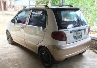 Daewoo Matiz MT 2004 - Bán Daewoo Matiz MT sản xuất 2004, màu trắng, xe chắc chắn vận hành êm ái, máy móc miễn bàn
