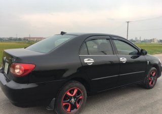 Toyota Corolla altis  1.8G MT  2004 - Bán ô tô Toyota Corolla Altis đời 2004, màu đen, 242tr