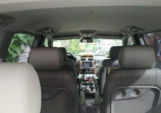 Kia Carnival  GS   2009 - Cần bán lại xe Kia Carnival GS sản xuất 2009, màu nâu, xe nhập