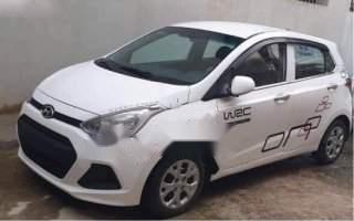 Hyundai Grand i10   2015 - Bán xe Hyundai Grand i10 đời 2015, màu trắng, số sàn 