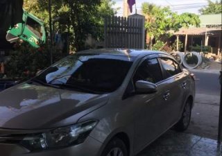 Toyota Vios  E 1.5  2015 - Cần bán xe Toyota Vios E 1.5 năm 2015, màu vàng cát