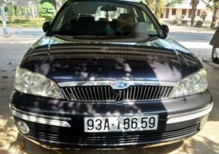 Ford Laser   	Deluxe 1.6 MT  2003 - Bán xe Ford Laser Sx 2003, số tay, máy xăng, màu xám, odo 181000 km