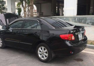 Toyota Corolla altis   2010 - Bán xe Toyota Corolla Altis đời 2010, màu đen, còn rất mới
