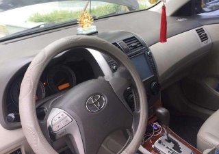 Toyota Corolla altis   2010 - Bán xe Toyota Corolla Altis đời 2010, màu đen, còn rất mới