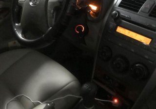 Toyota Corolla altis   2009 - Bán xe Toyota Corolla altis sản xuất năm 2009, màu đen đã đi 200.000 km
