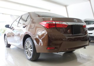 Toyota Corolla altis 1.8G AT 2016 - Bán Toyota Corolla Altis 1.8G AT 2016, màu nâu, giá 660tr