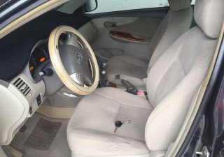 Toyota Corolla altis   2010 - Cần bán gấp Toyota Corolla Altis năm sản xuất 2010, màu đen, số sàn, xe nguyên bản