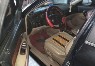 Daewoo Magnus   2004 - Gia đình bán xe Daewoo Magnus 2004, màu đen, xe nhập