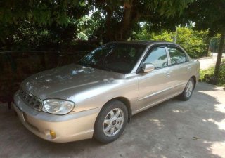 Kia Spectra 2005 - Bán xe Kia Spectra năm sản xuất 2005, màu vàng cát