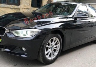 BMW 3 Series 320i 2012 - Cần bán xe BMW 320i sản xuất 2012, model 2013 màu đen