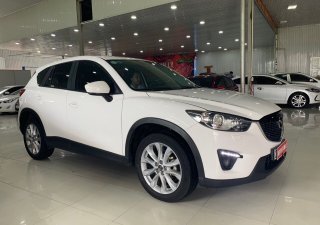Mazda CX 5 2014 - Bán xe Mazda CX 5 năm 2014, màu trắng, mới 95%, giá tốt 680 triệu đồng