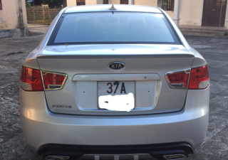 Kia Forte SX 2010 - Cần bán xe Kia Porte đời 2010 màu bạc, số sàn, nhập khẩu
