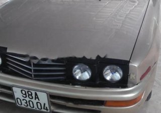 Toyota Corona GL 1.6 1990 - Cần bán xe Toyota Corona GL 1.6 sản xuất năm 1990, màu vàng 