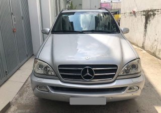 Mercedes-Benz ML Class 2003 - Bán Mercedes ML500 tự động 2003 ĐK 2007, màu bạc xe chính chủ