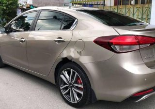 Kia Cerato   2016 - Bán Kia Cerato đời 2016, màu vàng, nhập khẩu  